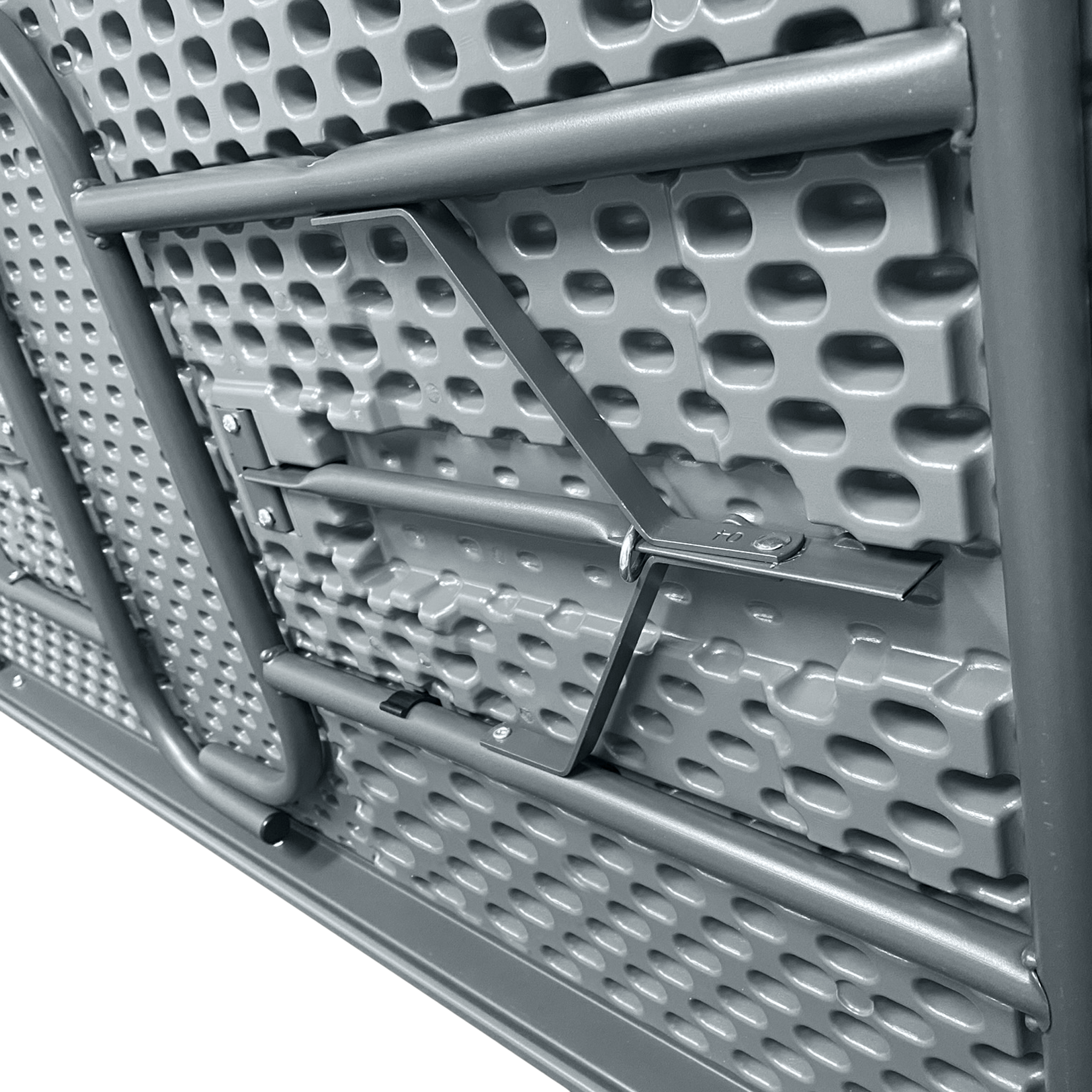 A picture of the underside of a folded charcoal table