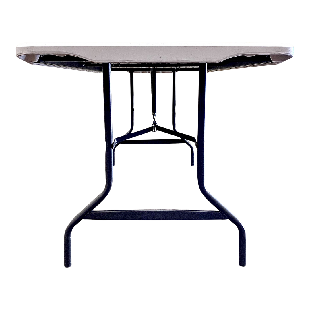 A close view of a platinum folding table. 