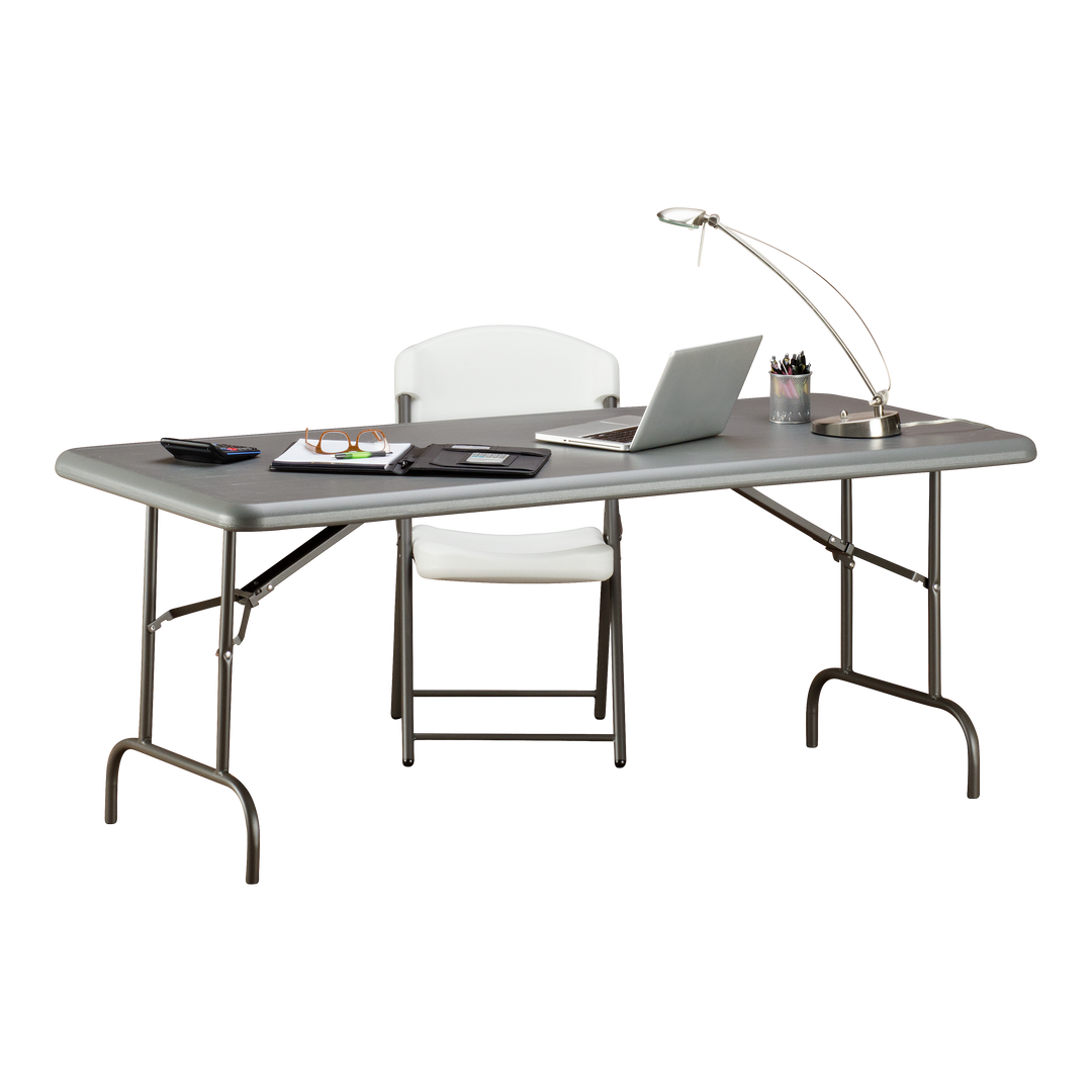 A charcoal table with office supplies on top.
