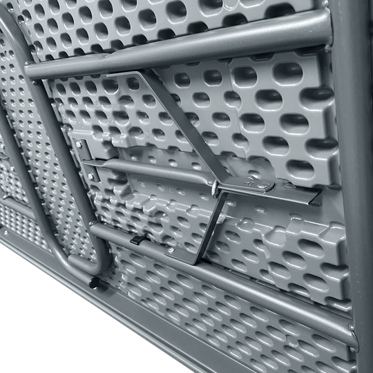 A picture of the underside of a folded charcoal table