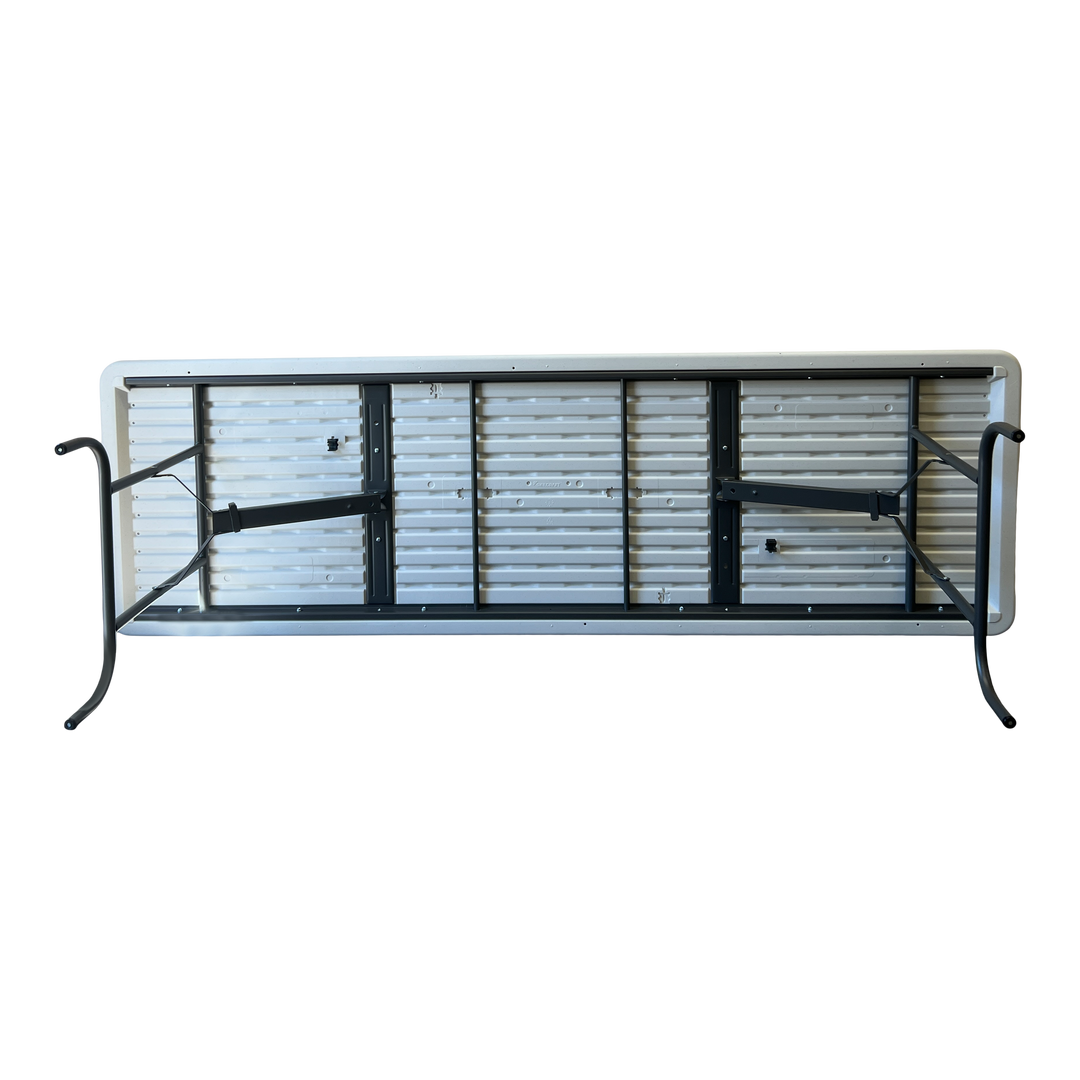 A picture of the underside of a charcoal folding table on its side.