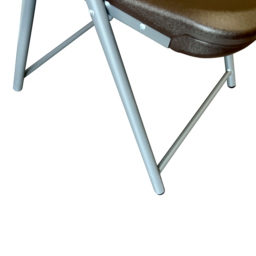 A close view of an edge of an espresso's chairs seat and legs.