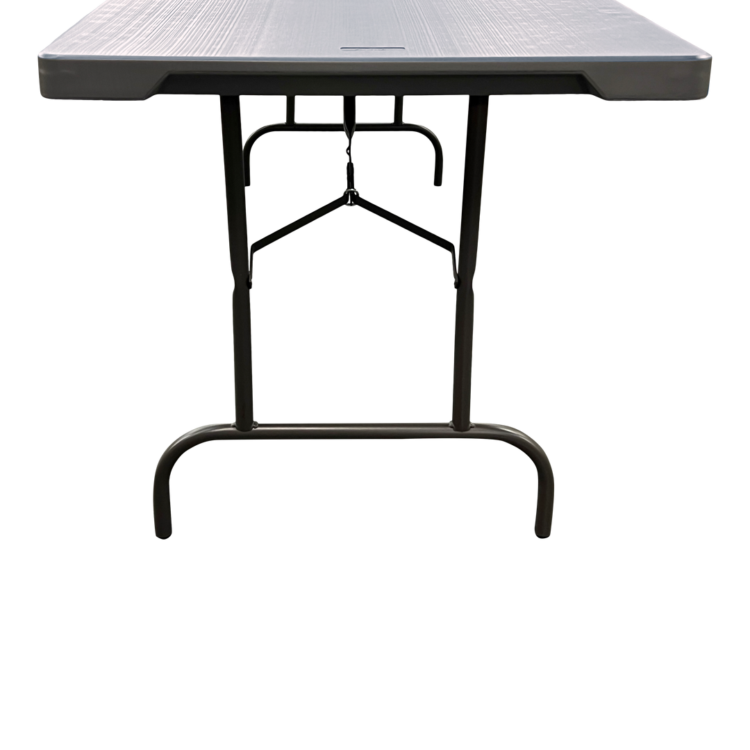A closeup picture of the front of a charcoal folding table.