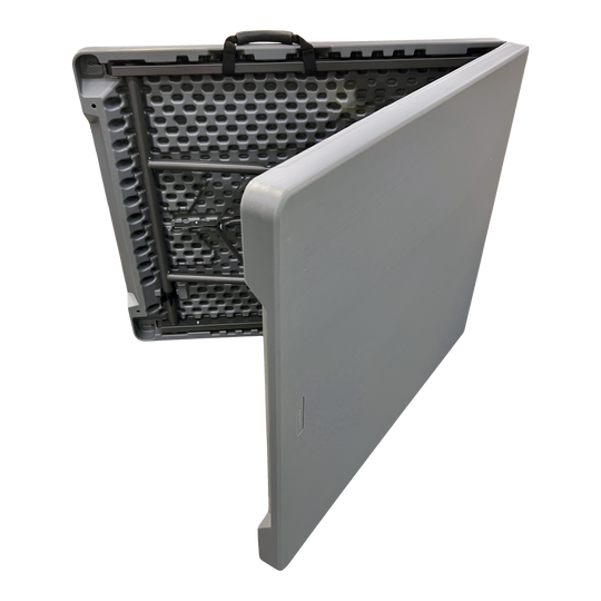 A picture of a partially folded charcoal bi-fold folding table.