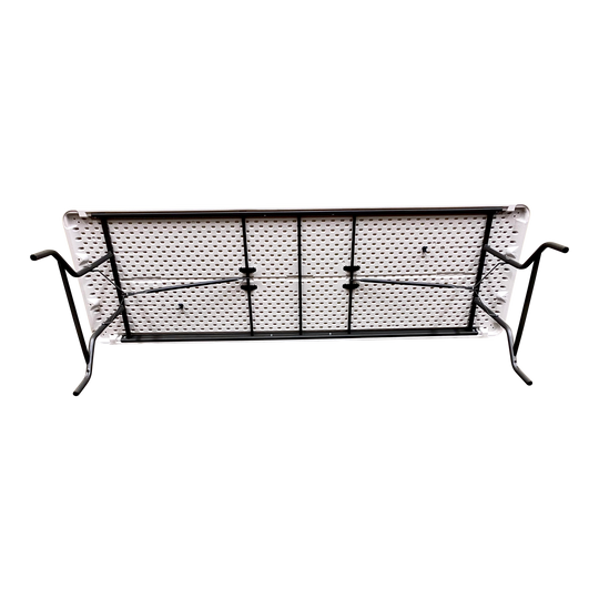An underside view of a platinum table standing on its side. 