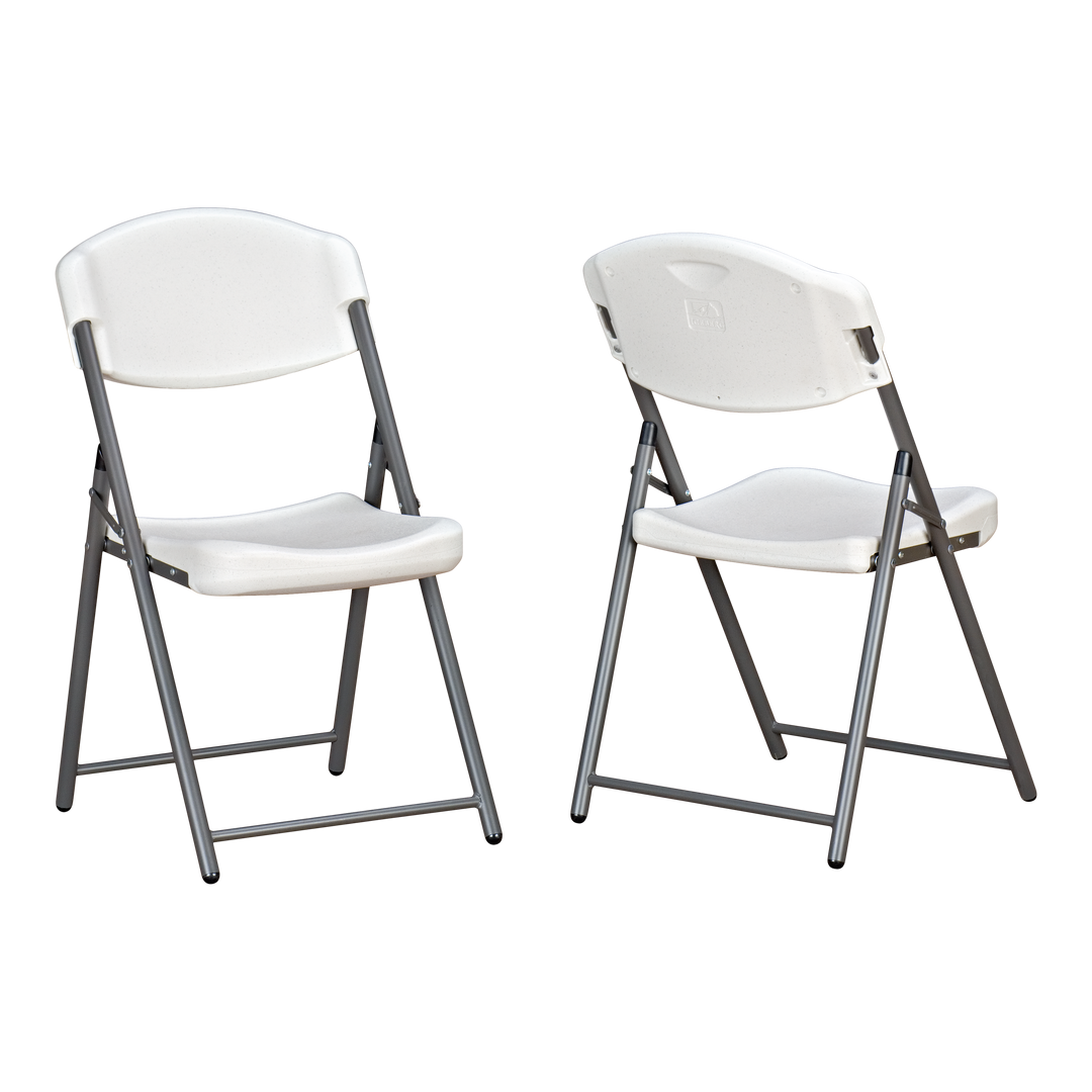 Two platinum chairs. One if facing forward and the other is facing backwards. 