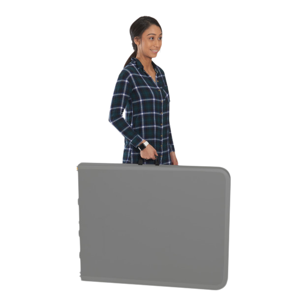 A person carrying a folded charcoal table. 